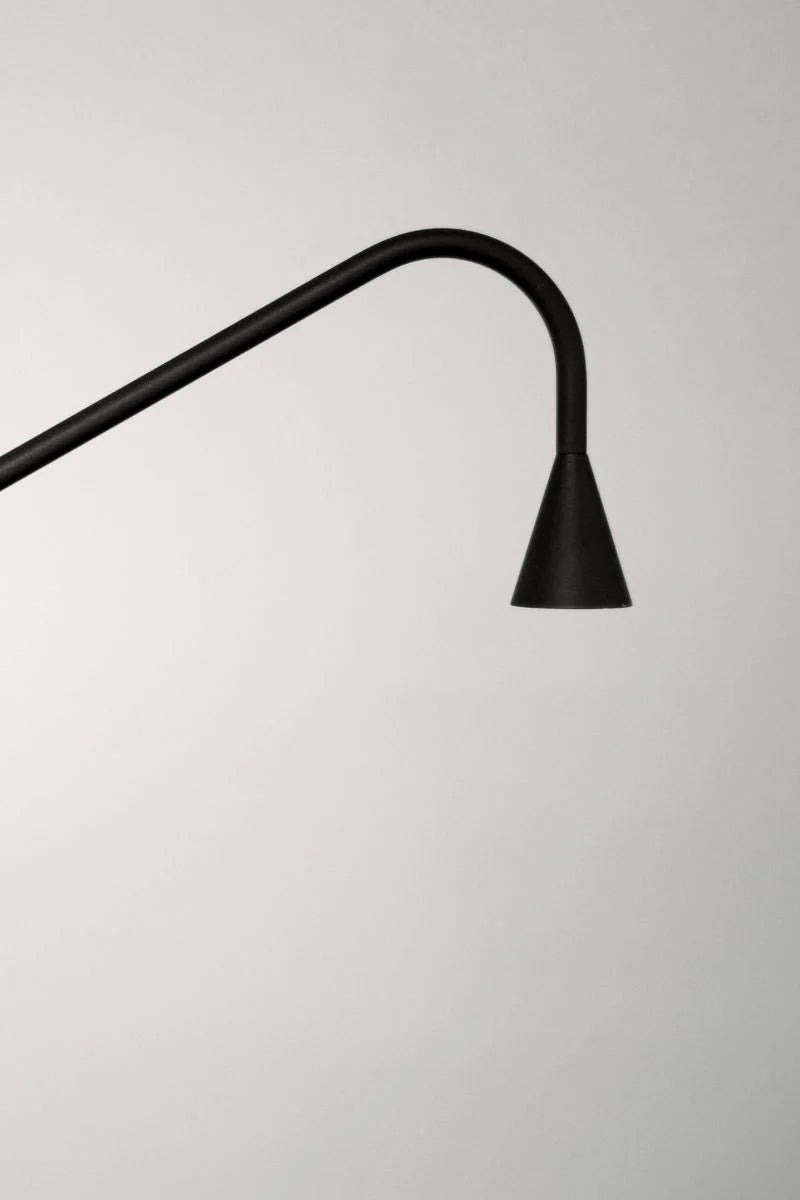 Close-up of the Austere Wall Lamp in Black by Trizo21.