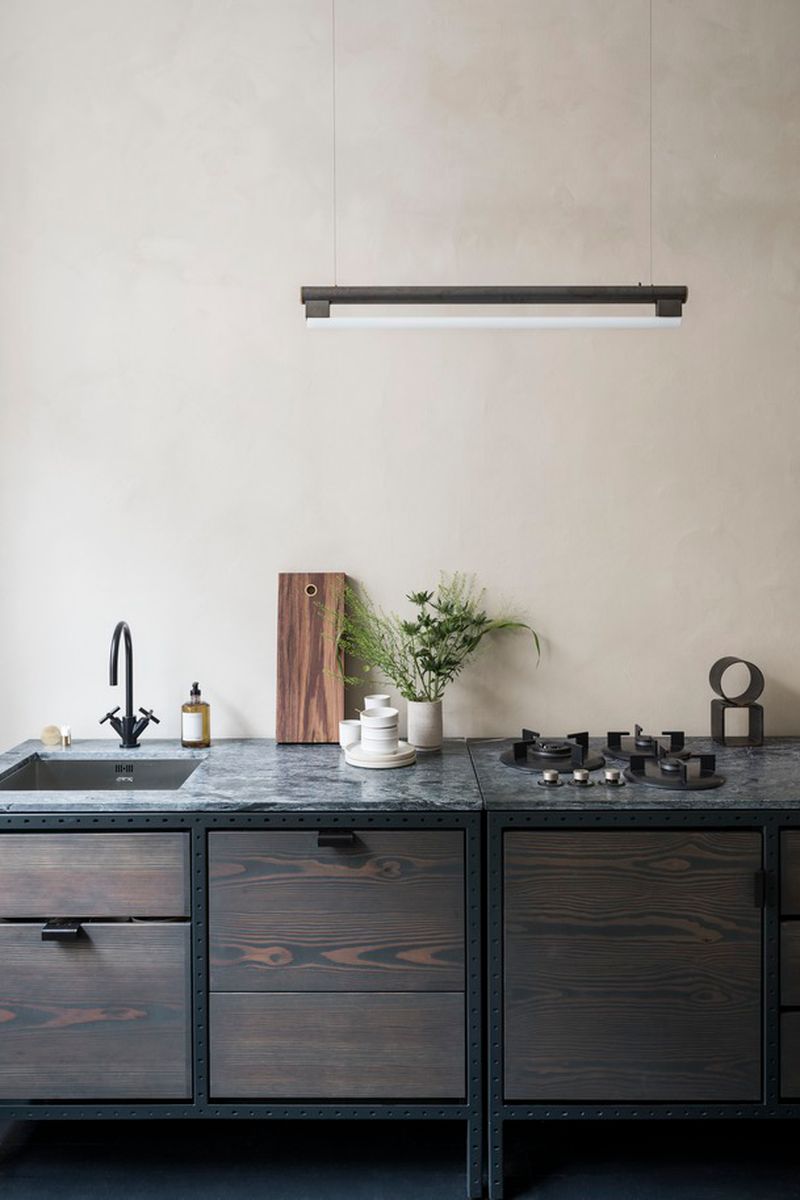 FRAMA Eiffel Lamp Pendant - steel and opal glass adjustable ceiling lamp hanging above an industrial design kitchen space