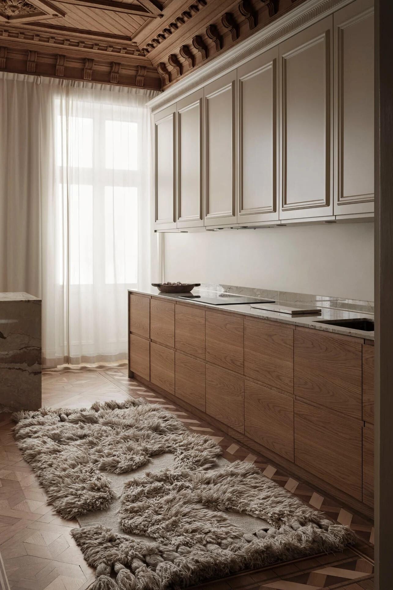 Big handwoven rug lying in a neutral kitchen interior