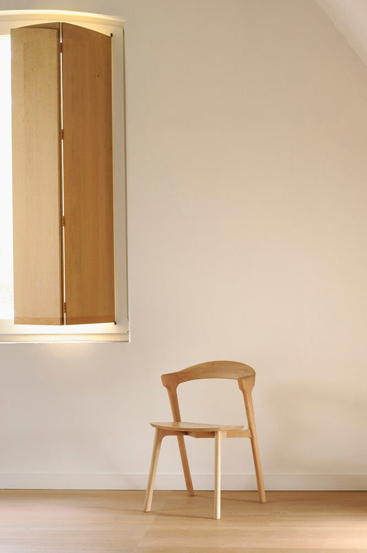 Bok Dining Chair Oak by Ethnicraft against wall