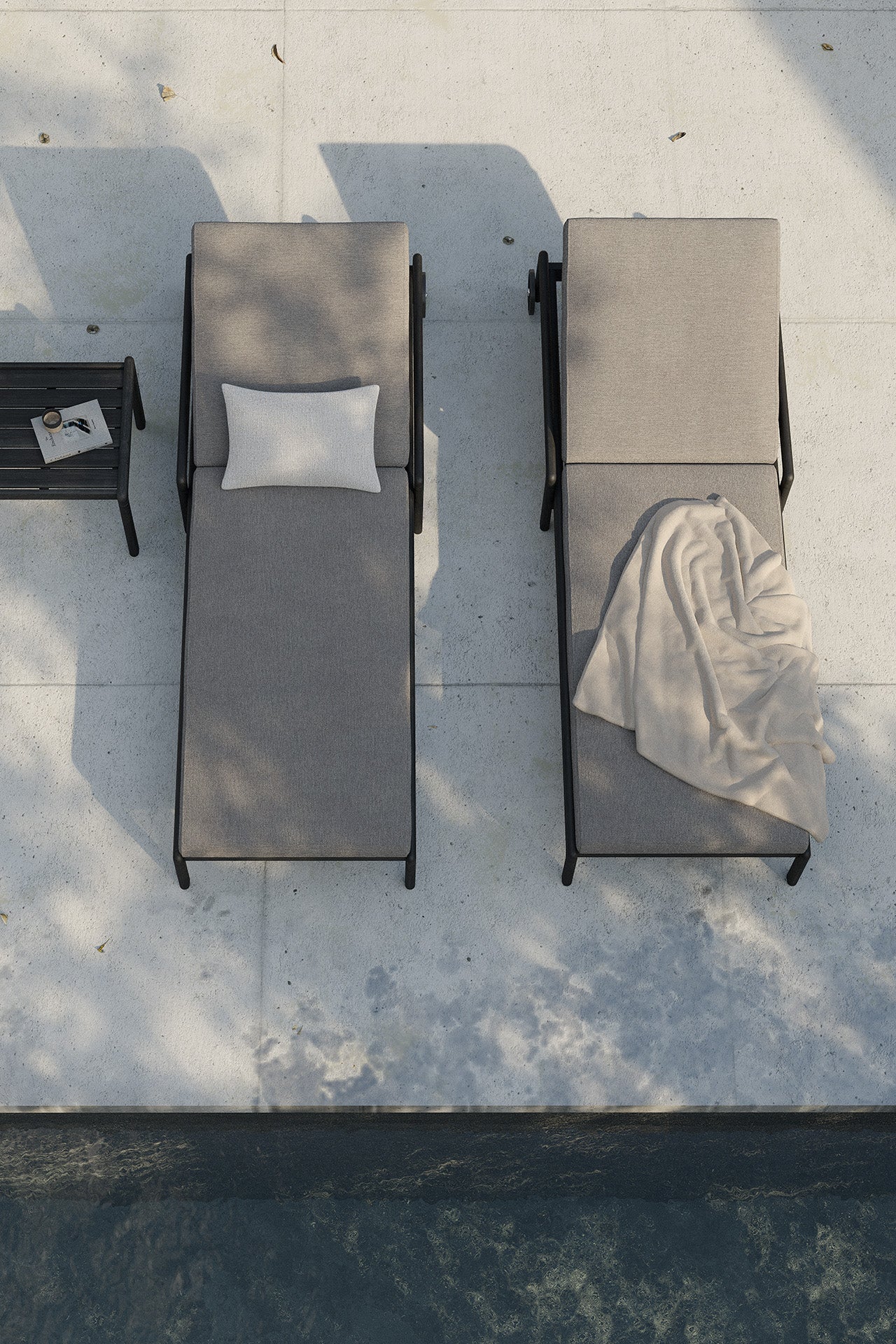 Jack outdoor boucle cushion in white on ethnicraft black lounger nexto to pool with side table and towel