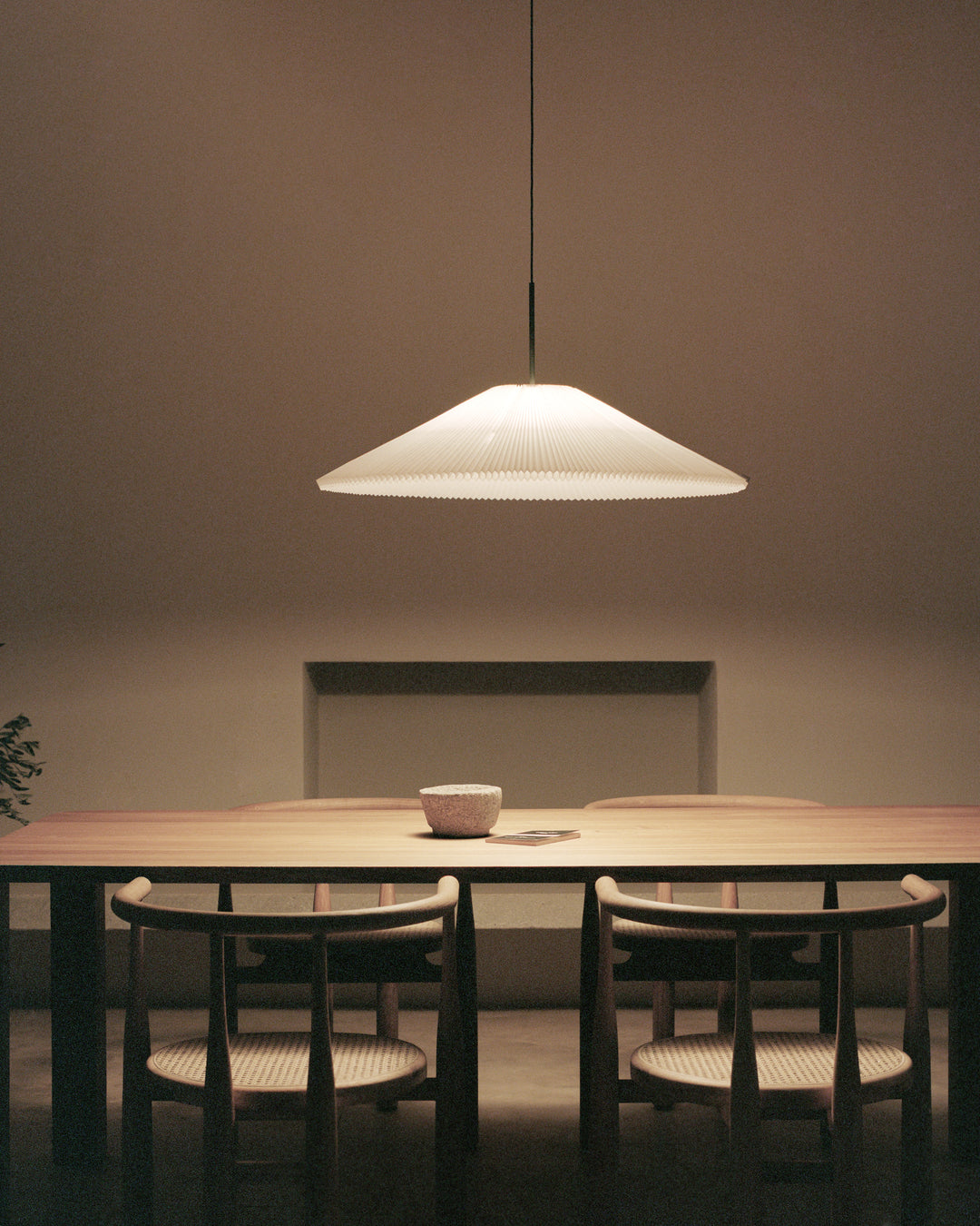 Nebra Pendant Lamp Large above dining table at night