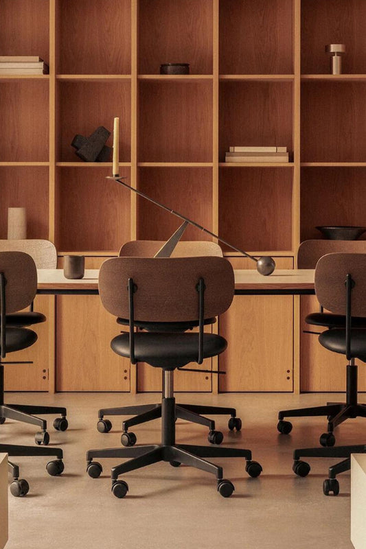 Co Task Chair Dark Stained Oak with Sierra 1001, Seat Upholstered with Black Frama by Audo Copenhagen in an office