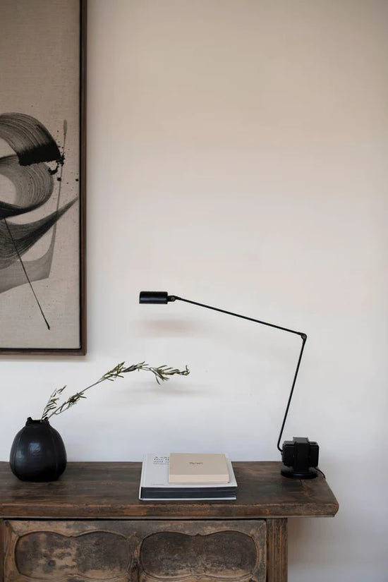 The Daphine Table Lamp by Lumina set on a wooden side table at Enter The Loft.