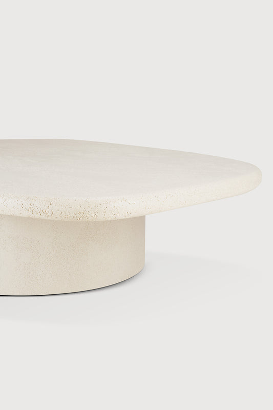 A close up of the elements coffee table pebble