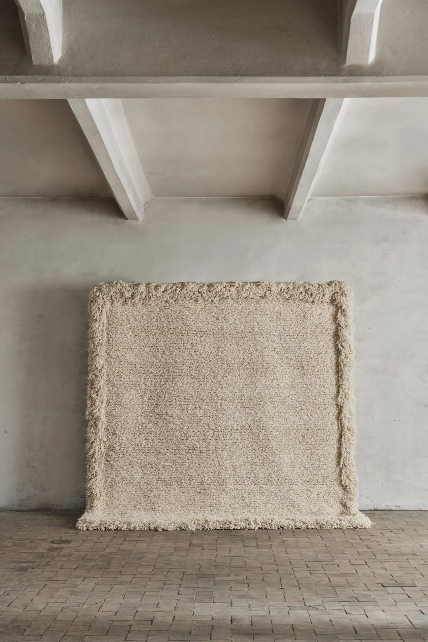 Cappelen Dimyr Handwoven Rug No.15 - big rug hanging on wall in neutral space