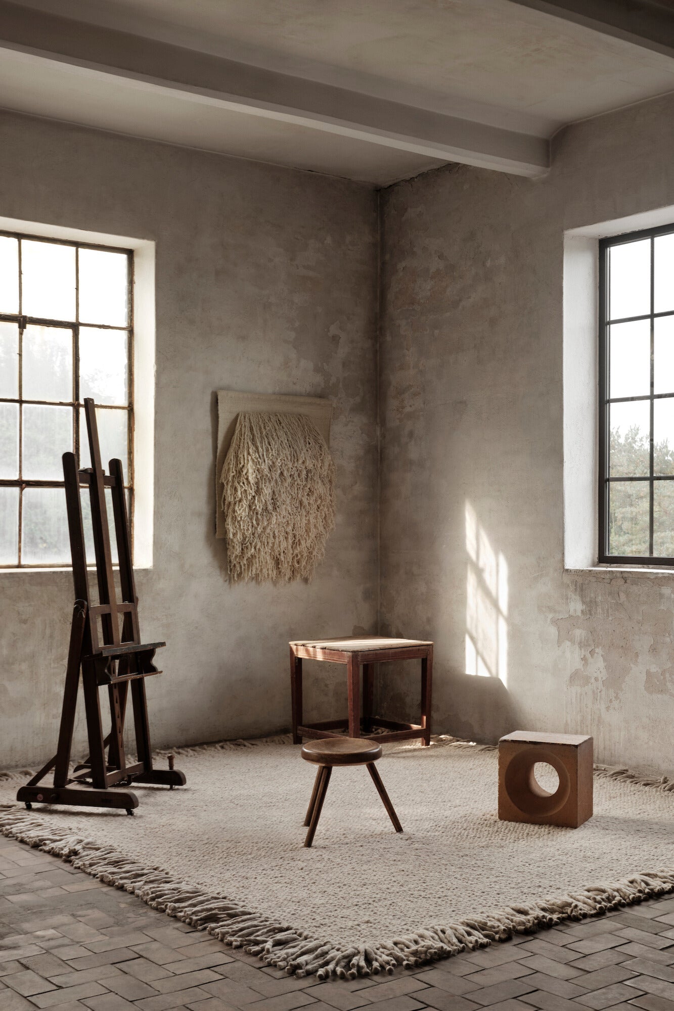 Handwoven Rug No.12 by Cappelen Dimyr  in brutalist interior