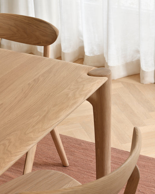 Pi Dining Table by Ethnicraft and Eye dining chair