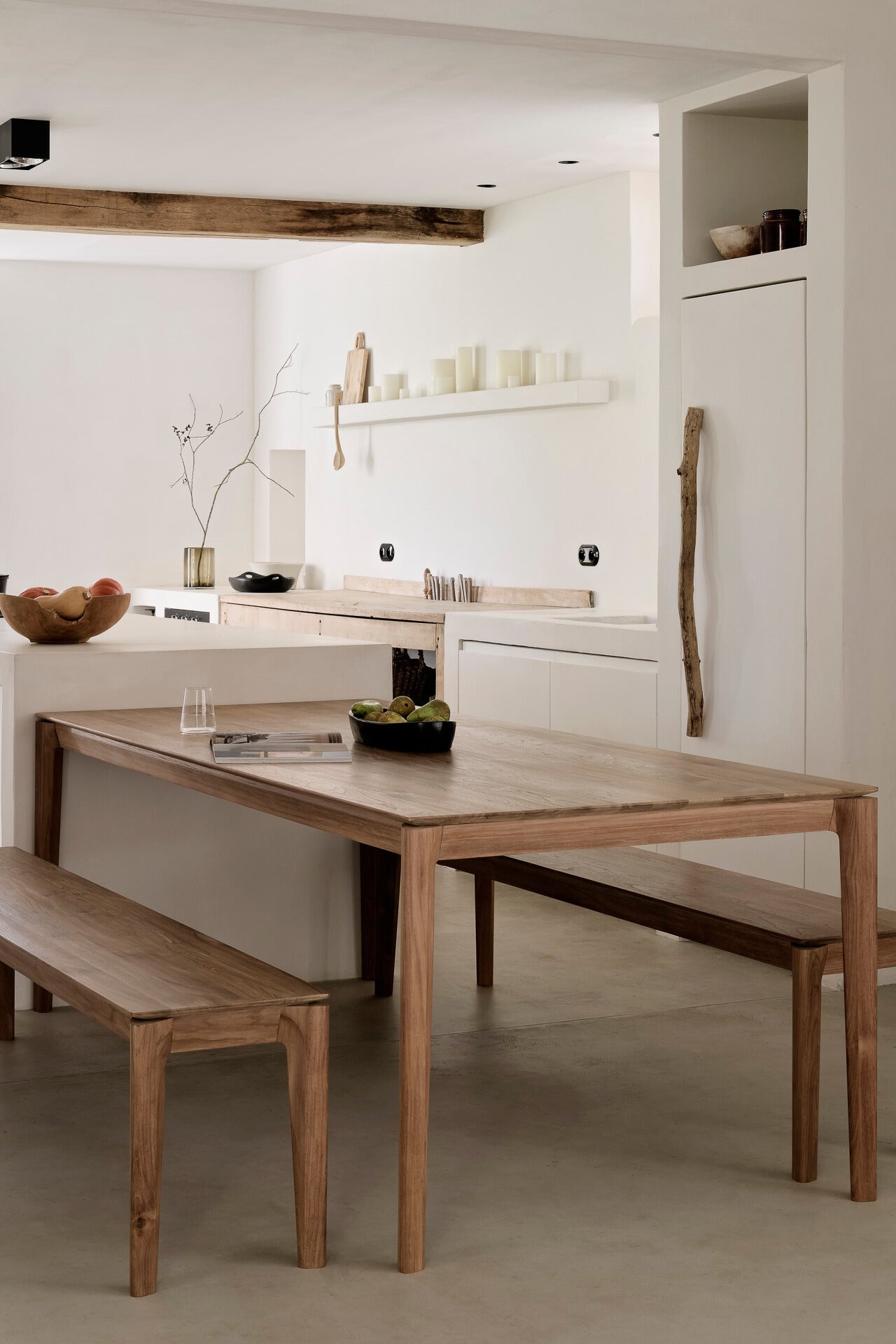 bok dining table teak in interior setting