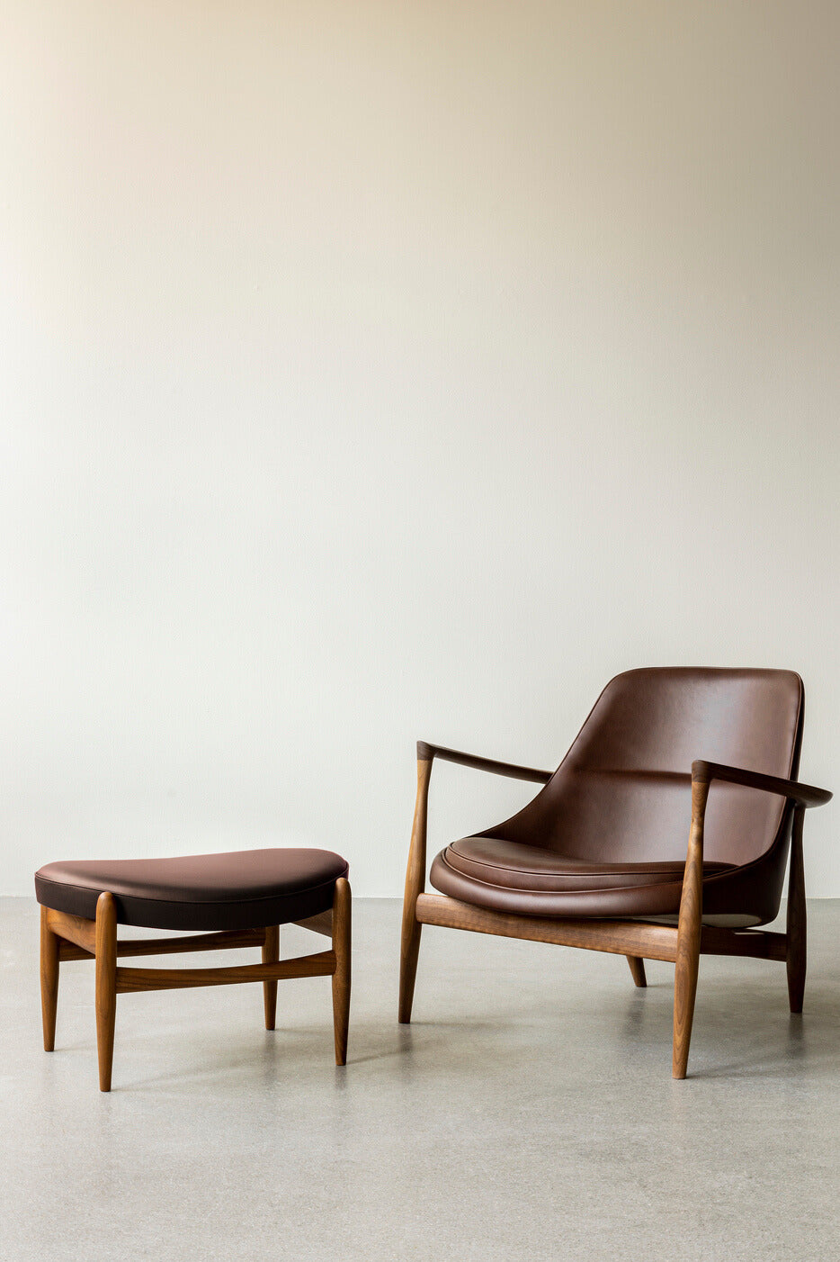 The Elizabeth Chair and Ottoman by Audo Copenhagen in Walnut with Dakar 0329