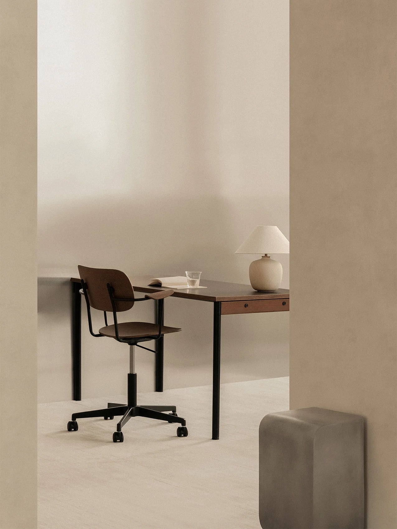 Audo Copenhagen Co Task Chair nexto brown desk in neutral beige office interior.