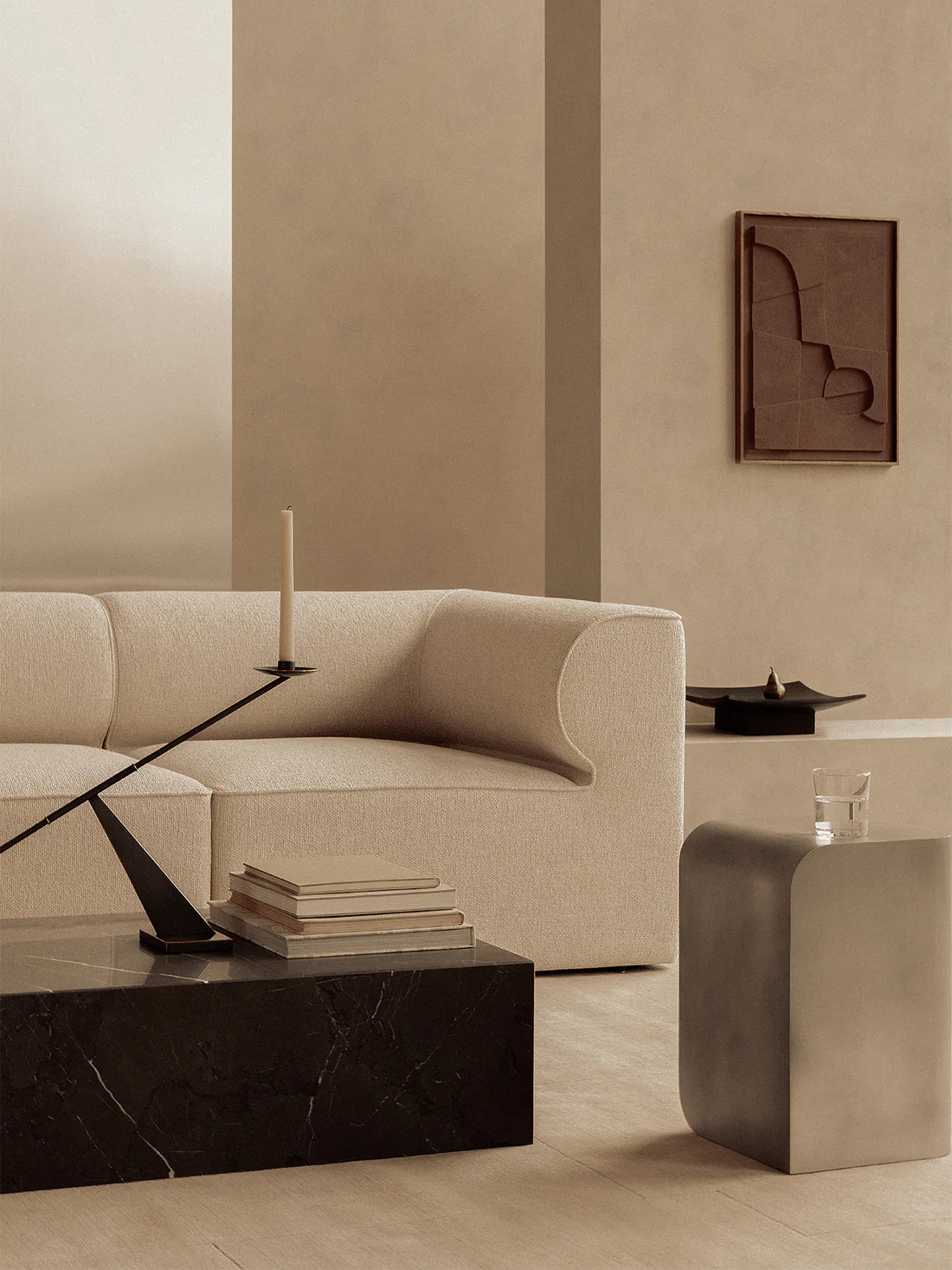 Volume Side Table by Audo Copenhagen in living  room setting with coffeetable and couch.