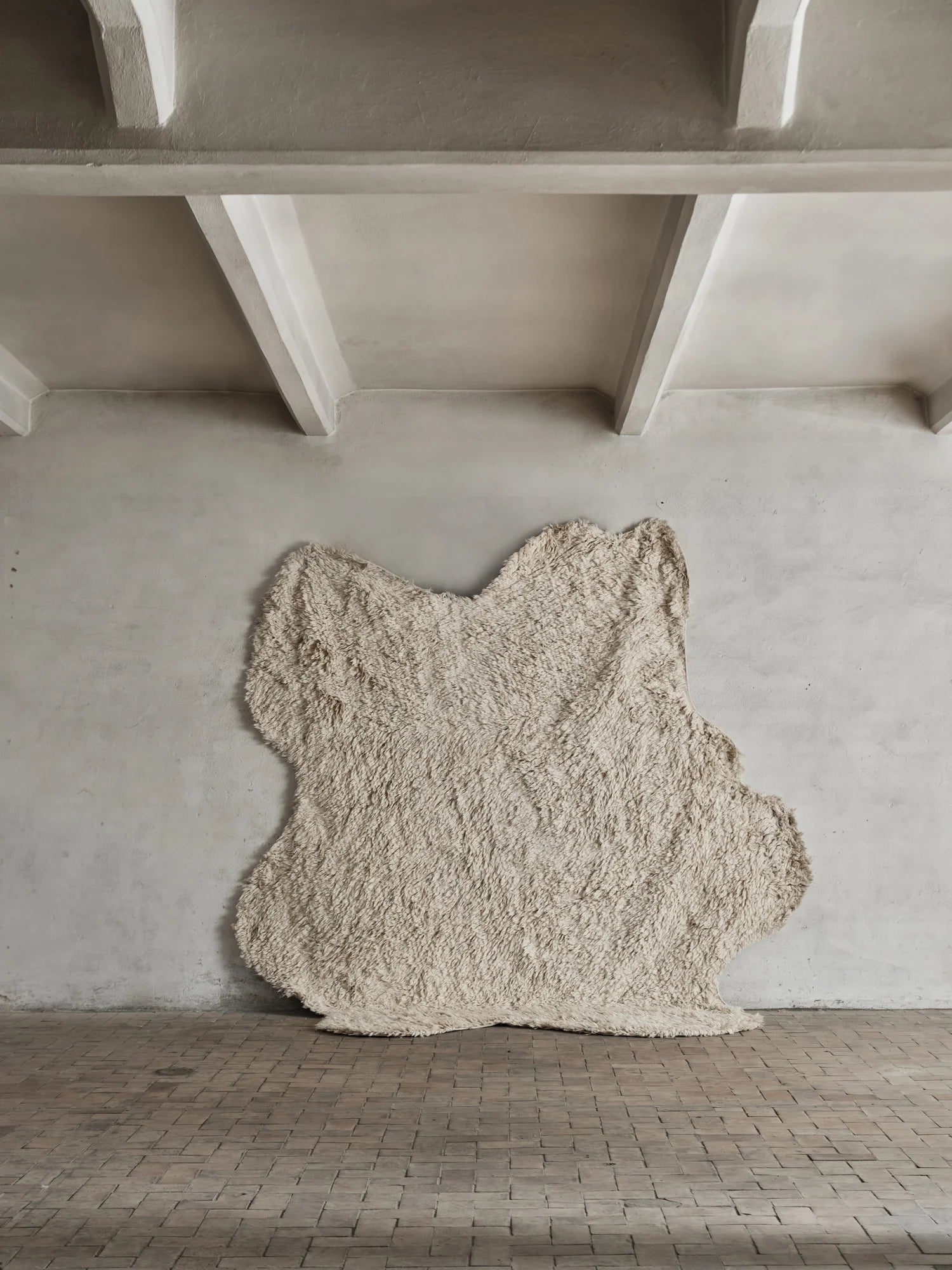 The Handwoven Rug No.09 by Cappelen Dimyr. Wool rug hanging at a wall