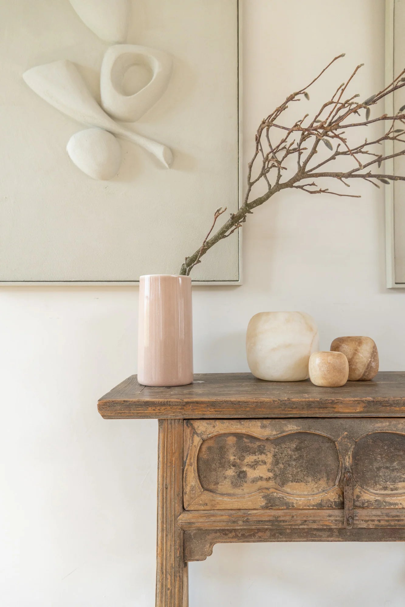 Alabaster Amber Tealights and vase with branch set on antique wooden table