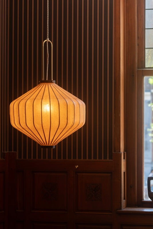 The Tuolo shaped lantern by Taiwan Lantern switched on