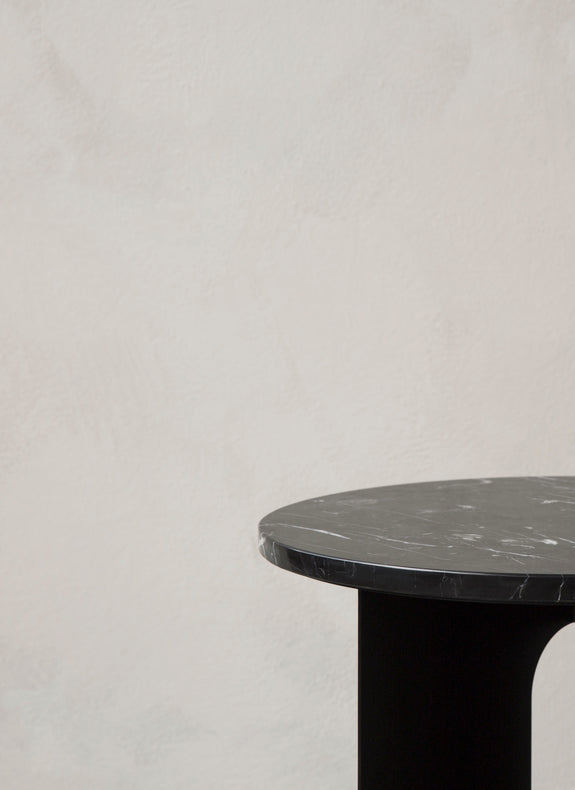 The Nero Marquina Marble Table Top on a Black Steel Base by Audo Copenhagen.