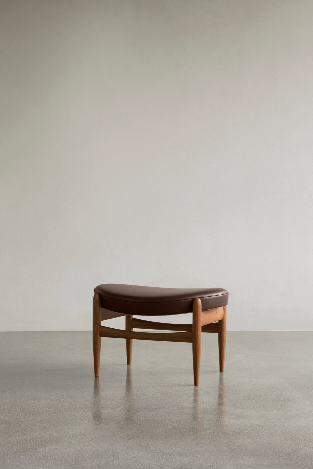 The Elizabeth Ottoman Walnut with Dakar 0329 seat by Audo Copenhagen