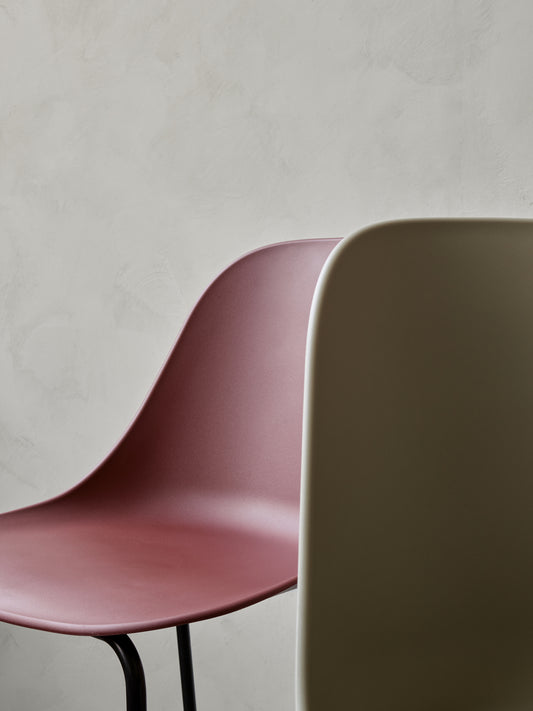 A close up of the Harbour Side Bar Chair in Burned Red and Olive from Audo Copenhagen