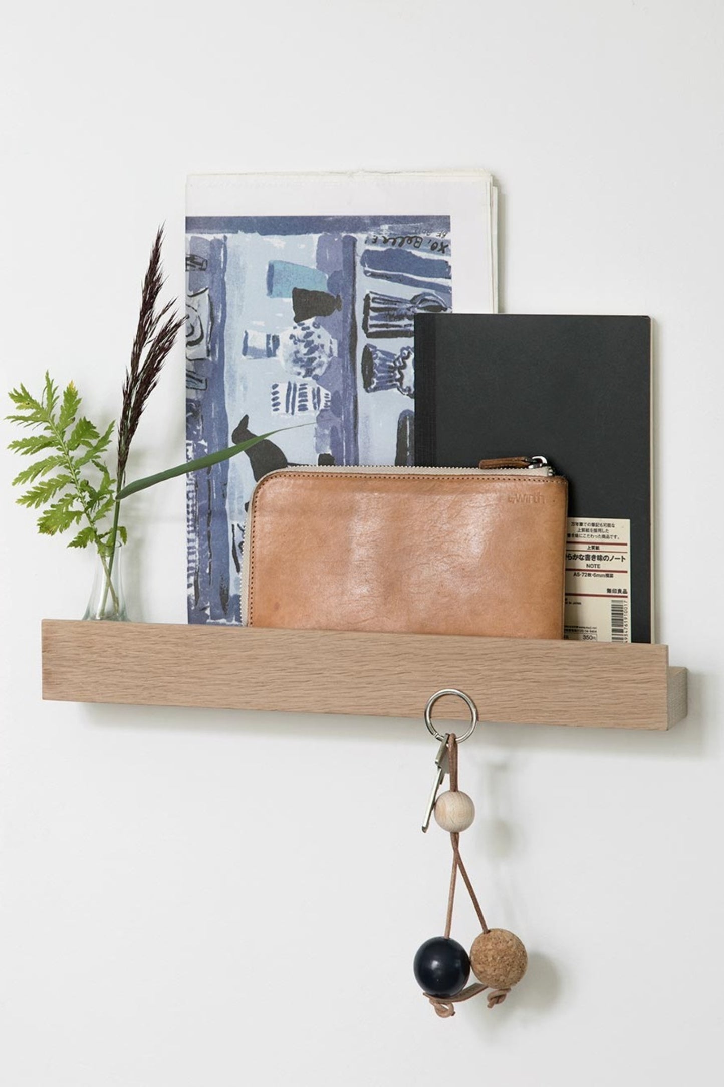 Magnet Shelf by EKTA Living - Wooden magnet shelf in use, holding notebook, wallet and keys. A modern and unique way to showcase your favourite items.