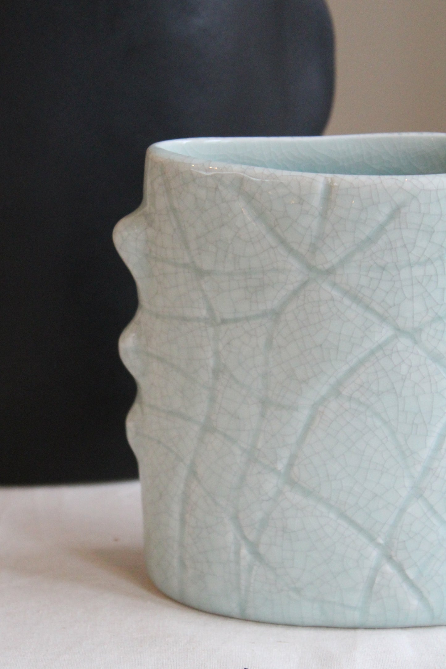 Close-up of the Homere Celadon Vase by Jars Ceramistes.