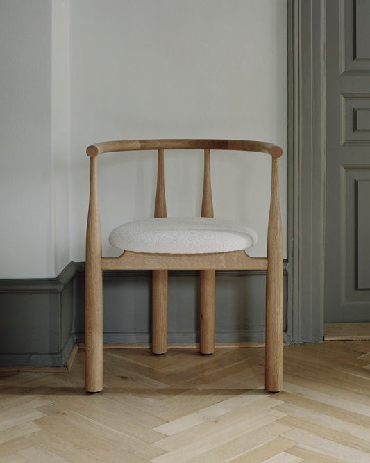 The Bukowski Chair Oak from New Works upfront.