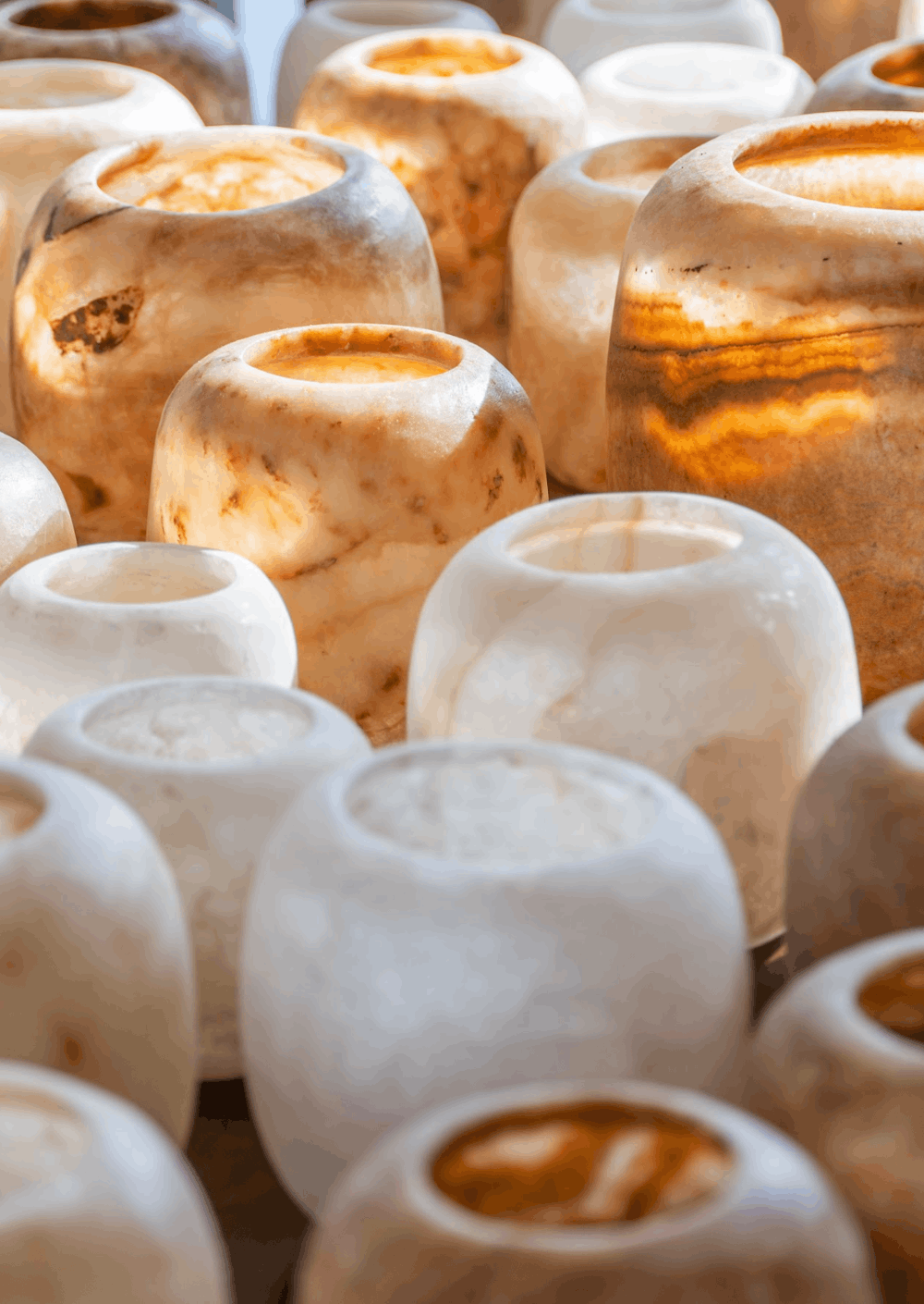 Large collection of Alabaster Tea Light Holders in Amber and White