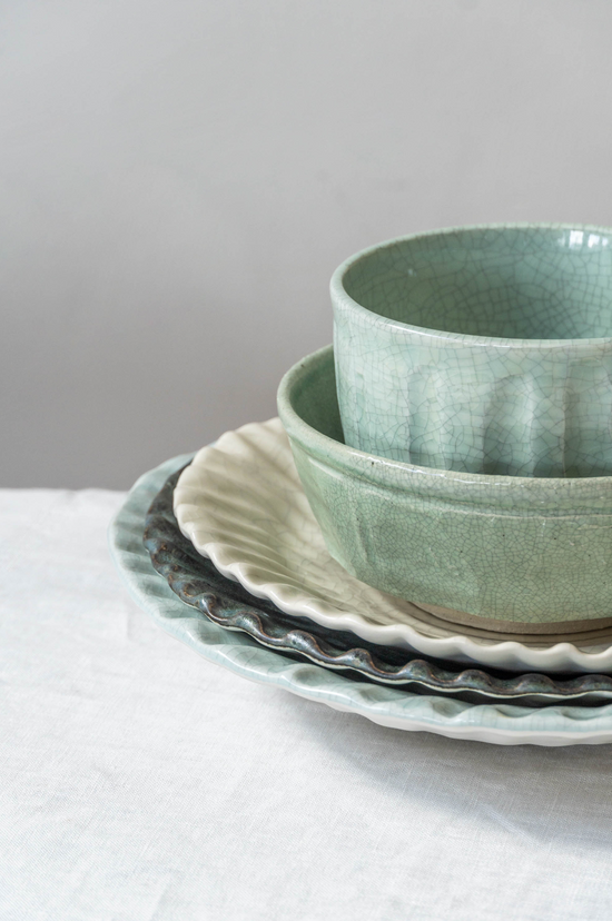 A beautiful plates and bowls set by Jars Ceramistes.