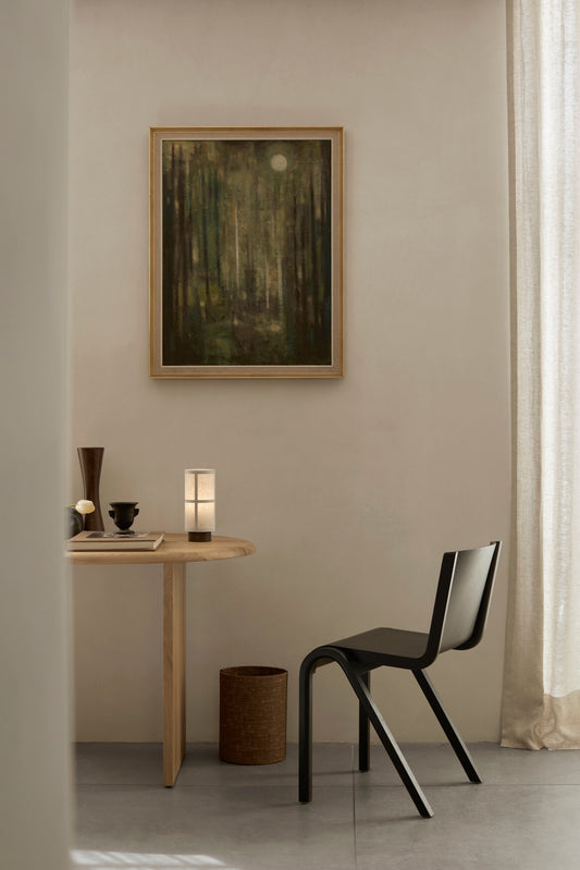 Hashira Raw portable Table Lamp By Audo Copenhagen on side table 