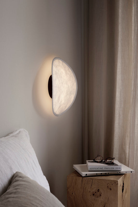 Tense Wall Lamp Black Base By New Works in interior setting