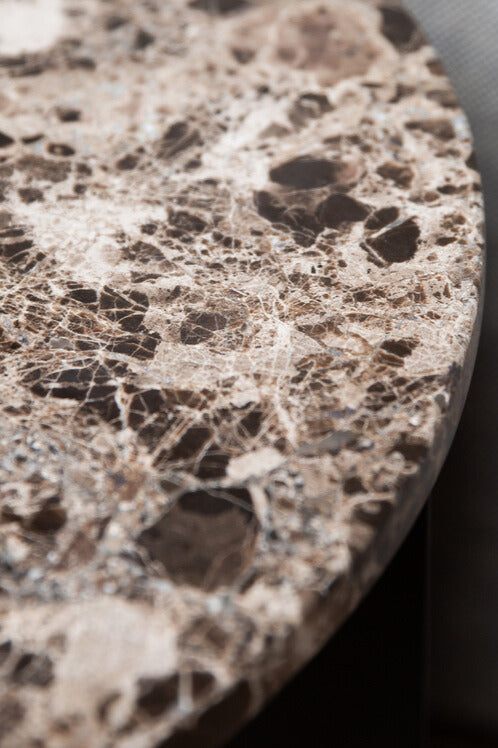 A close up of the Emperador Marble by Audo Copenhagen.