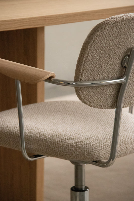 A close up of the Co Task Chairs Fully Upholstered with Aluminium Frame in Audo Bouclé 02.