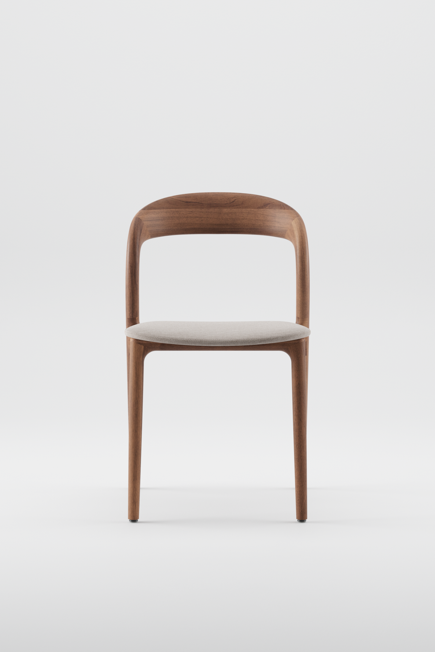 The Neva Dining Chair in Walnut with Upholstered Seat in Fabric by Artisan