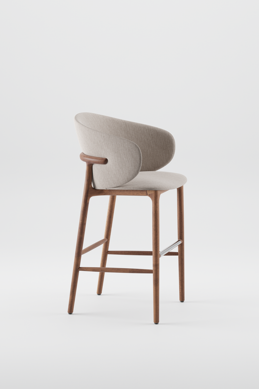 The Mela Bar Chair from Artisan. European Walnut and stainless steel footrest