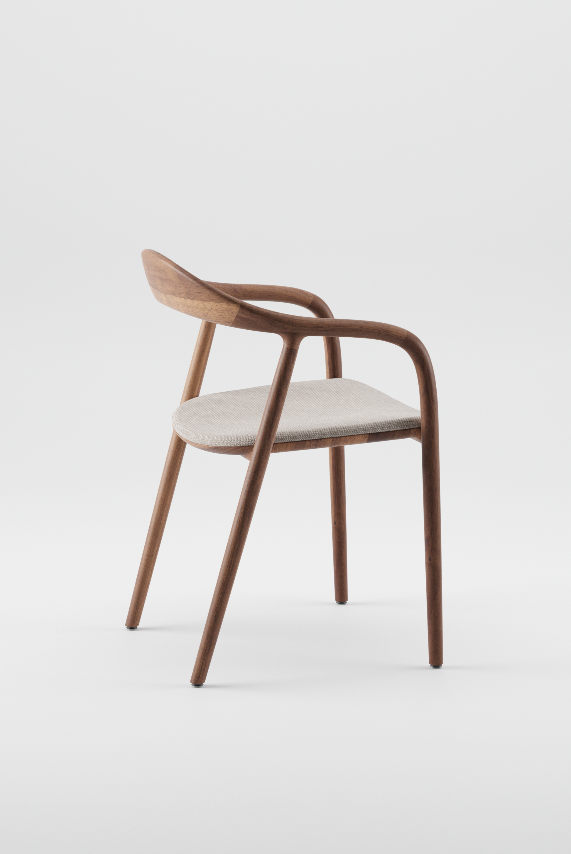 The Neva Chair in European Walnut with Upholstered seat by Artisan