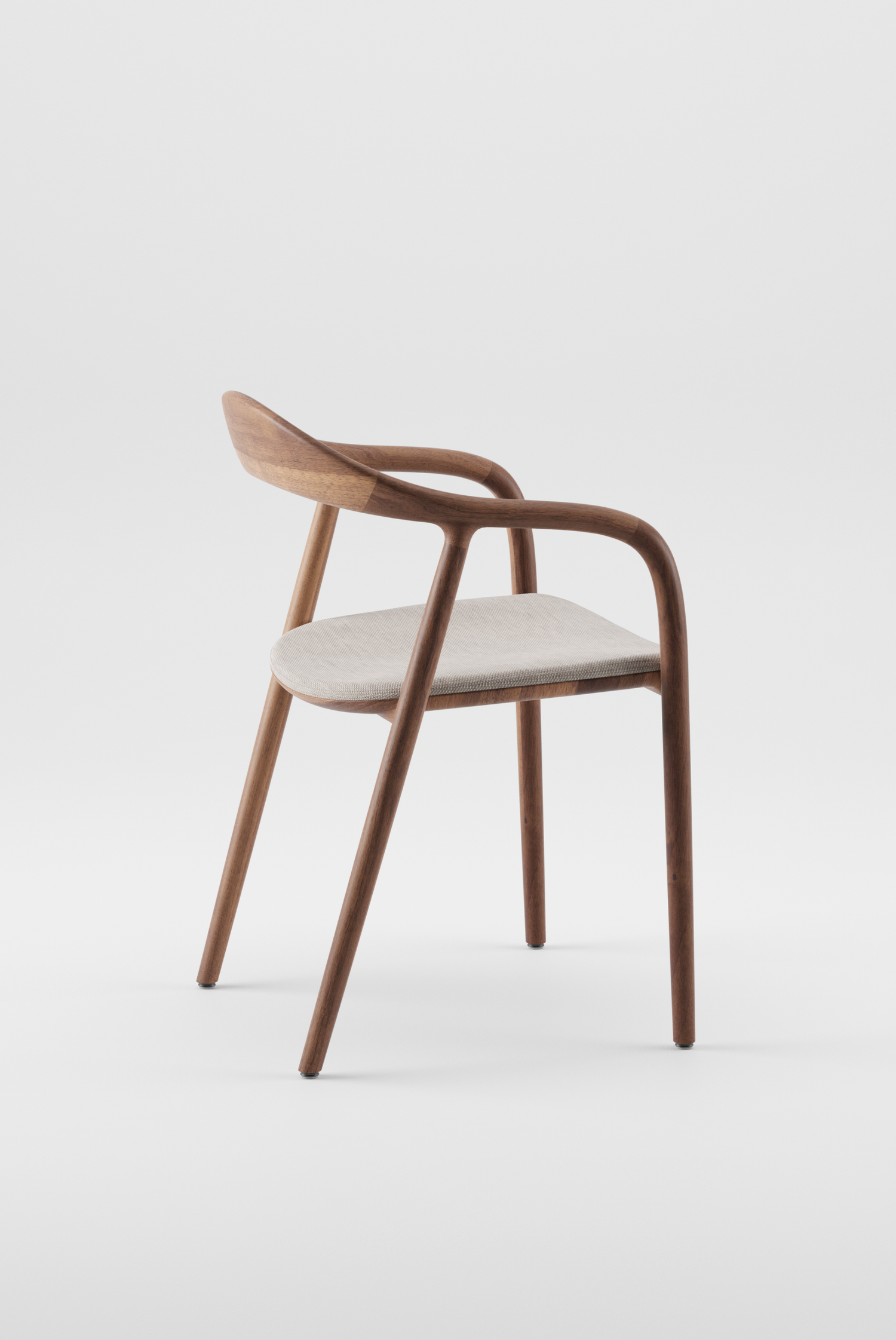 The Neva Chair in European Walnut with Upholstered seat by Artisan