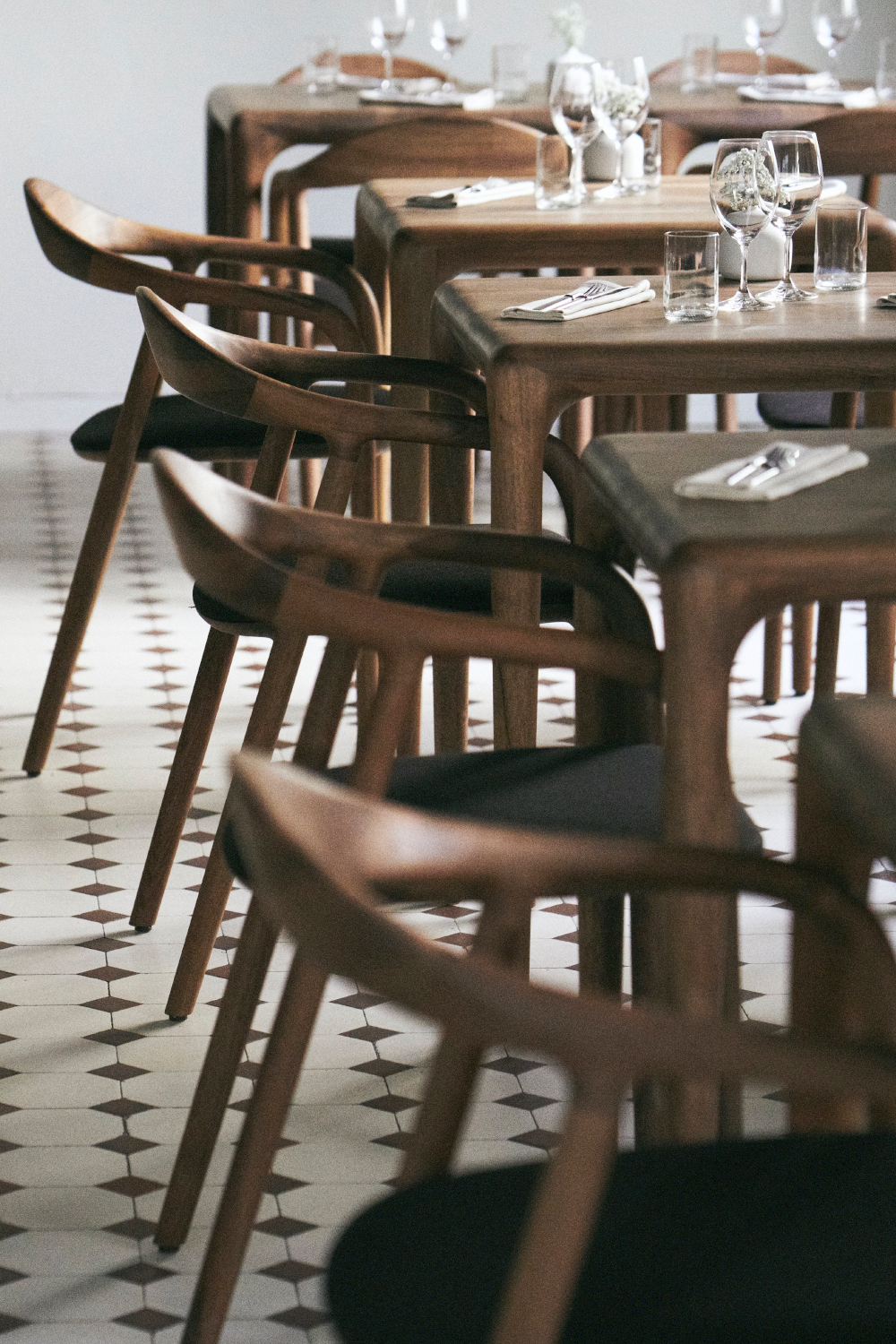 The Neva Chair in European Walnut by Artisan upclose photo