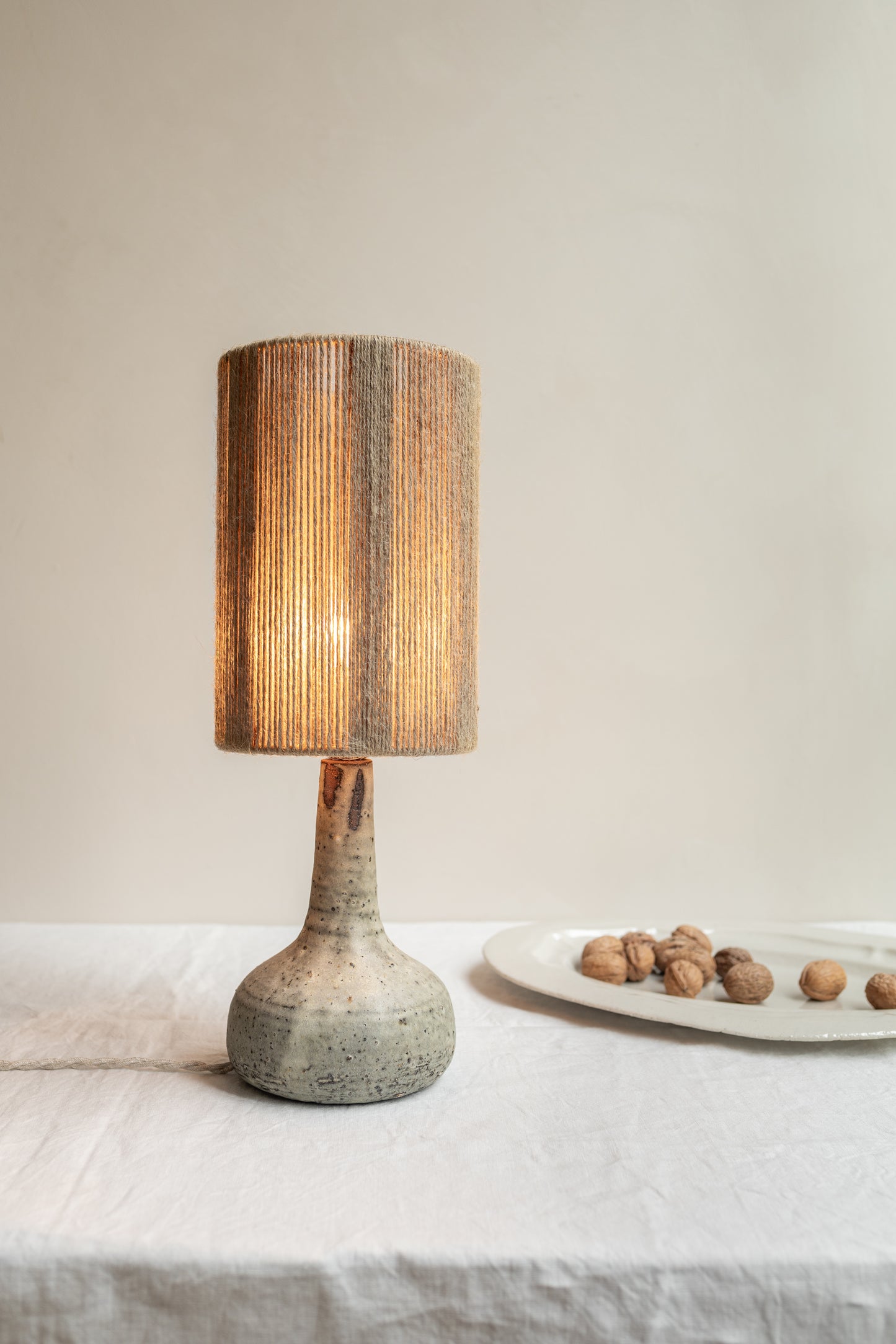 Handmade Grès Ceramics lamp with light on