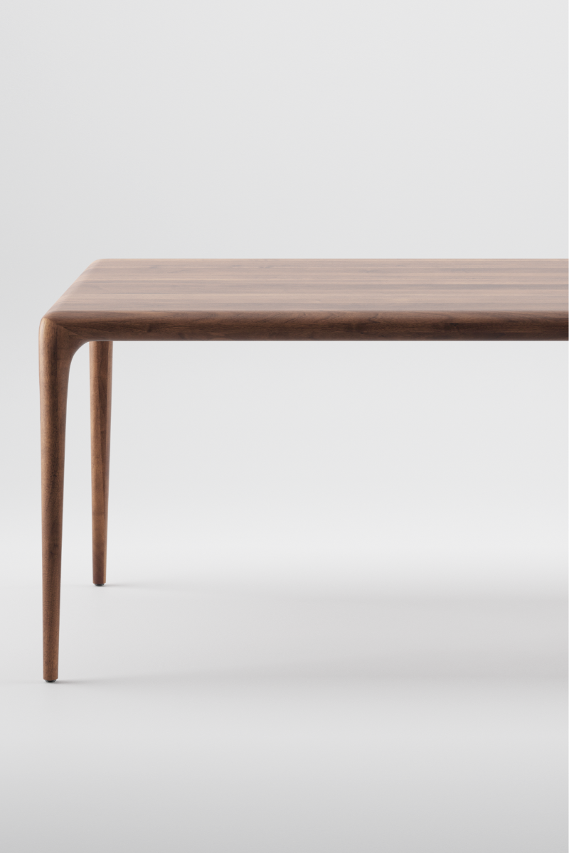 The Lakri Dining Table in Walnut by Artisan product photo