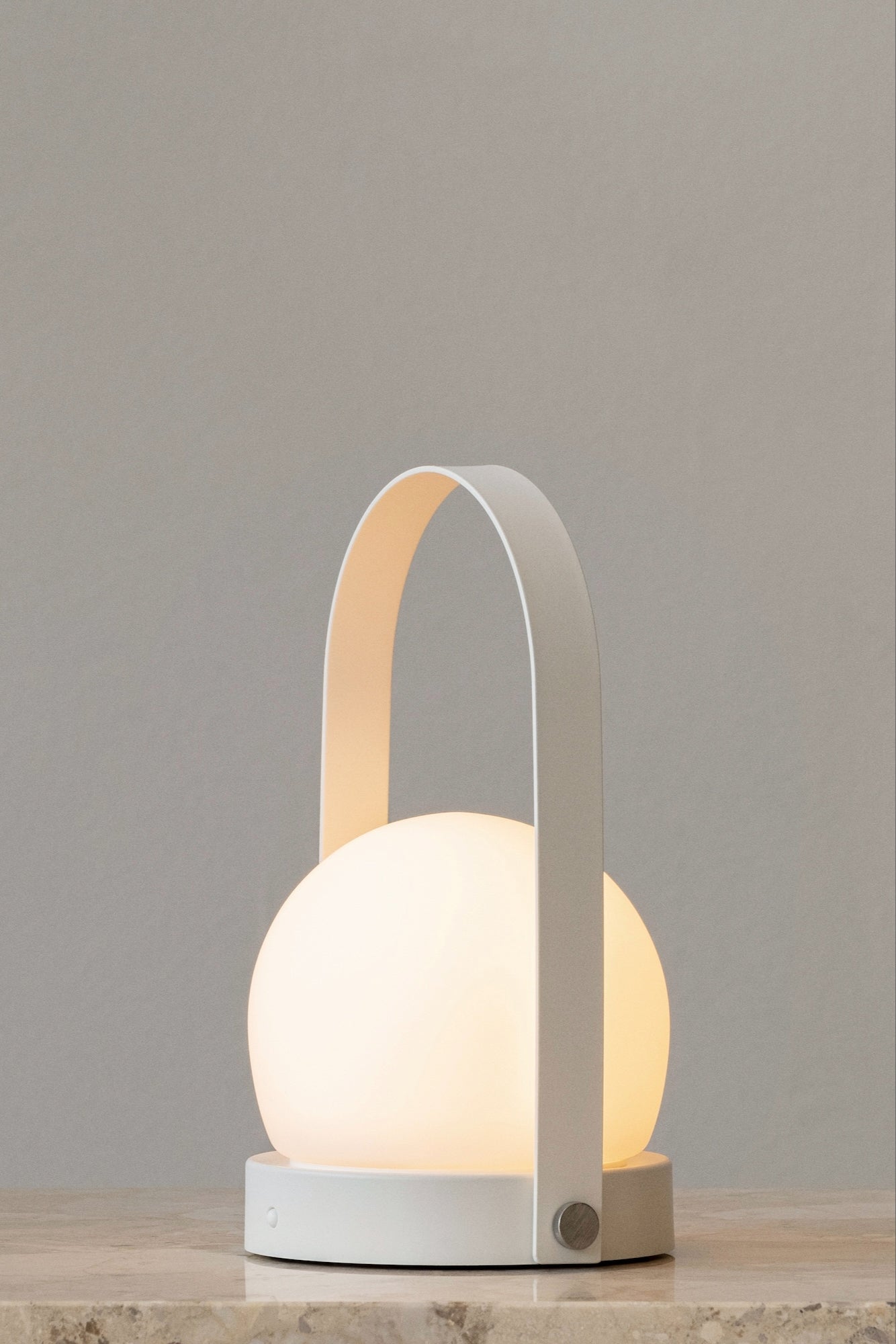 Column Portable Lamp White, designed by Norm Architects for Audo Copenhagen (Menu) lights on