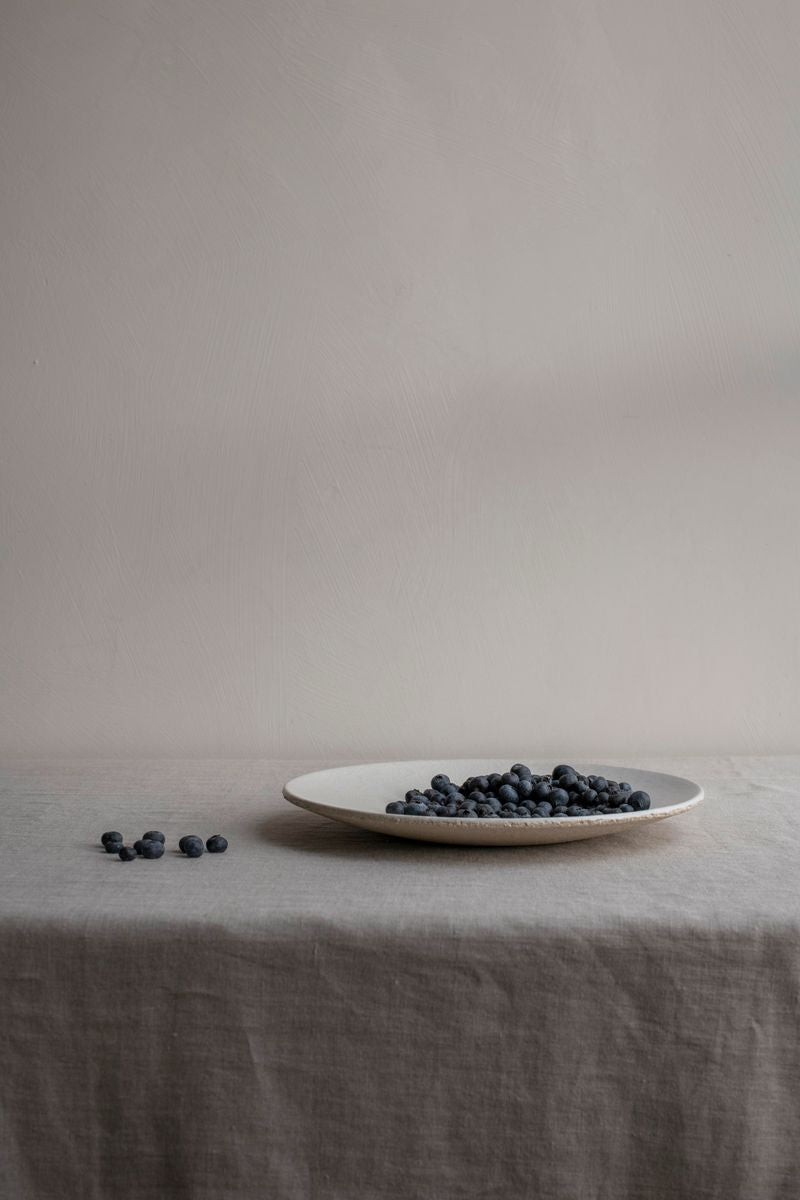 Wabi Round Plate by Jars Ceramistes with blueberries.