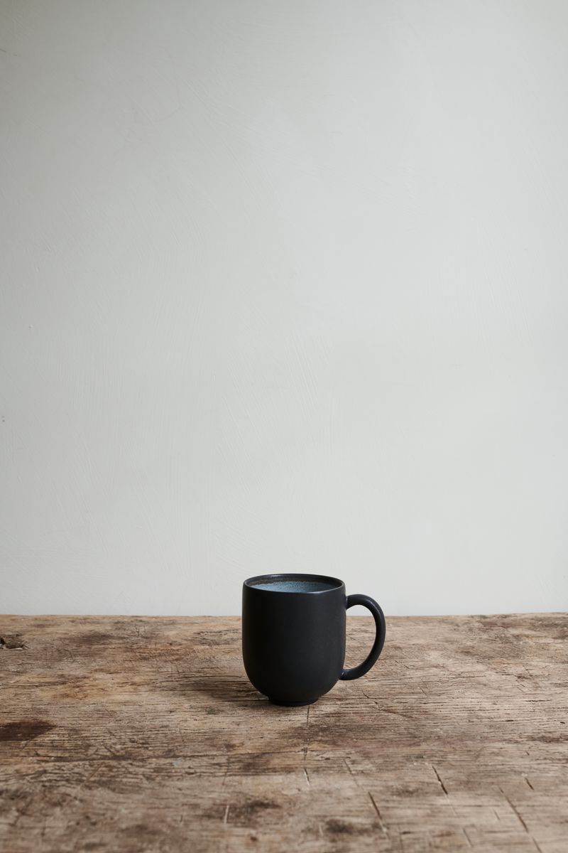 Ecorce Mug by Jars Ceramistes on wooden table.