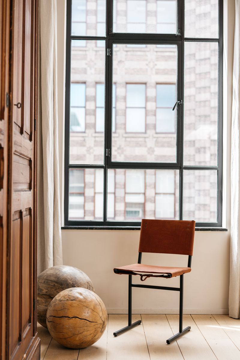 Memento Chair, Black Frame by WDSTCK in Classic Brown.