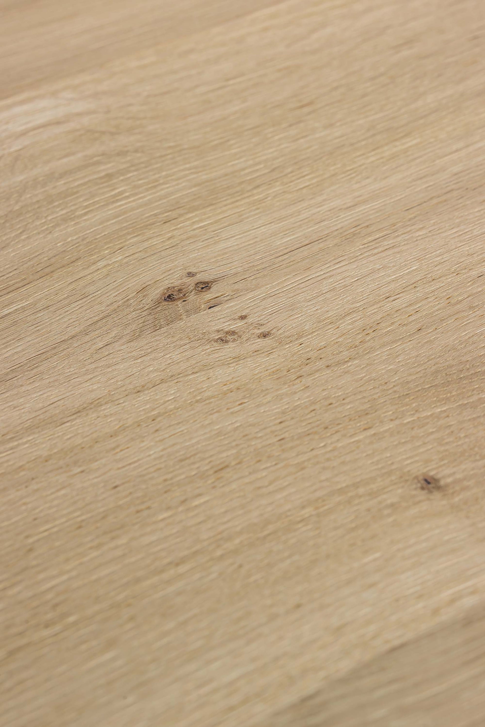 Close-up of the natural oak wood grain of the Brix Table by Heerenhuis.