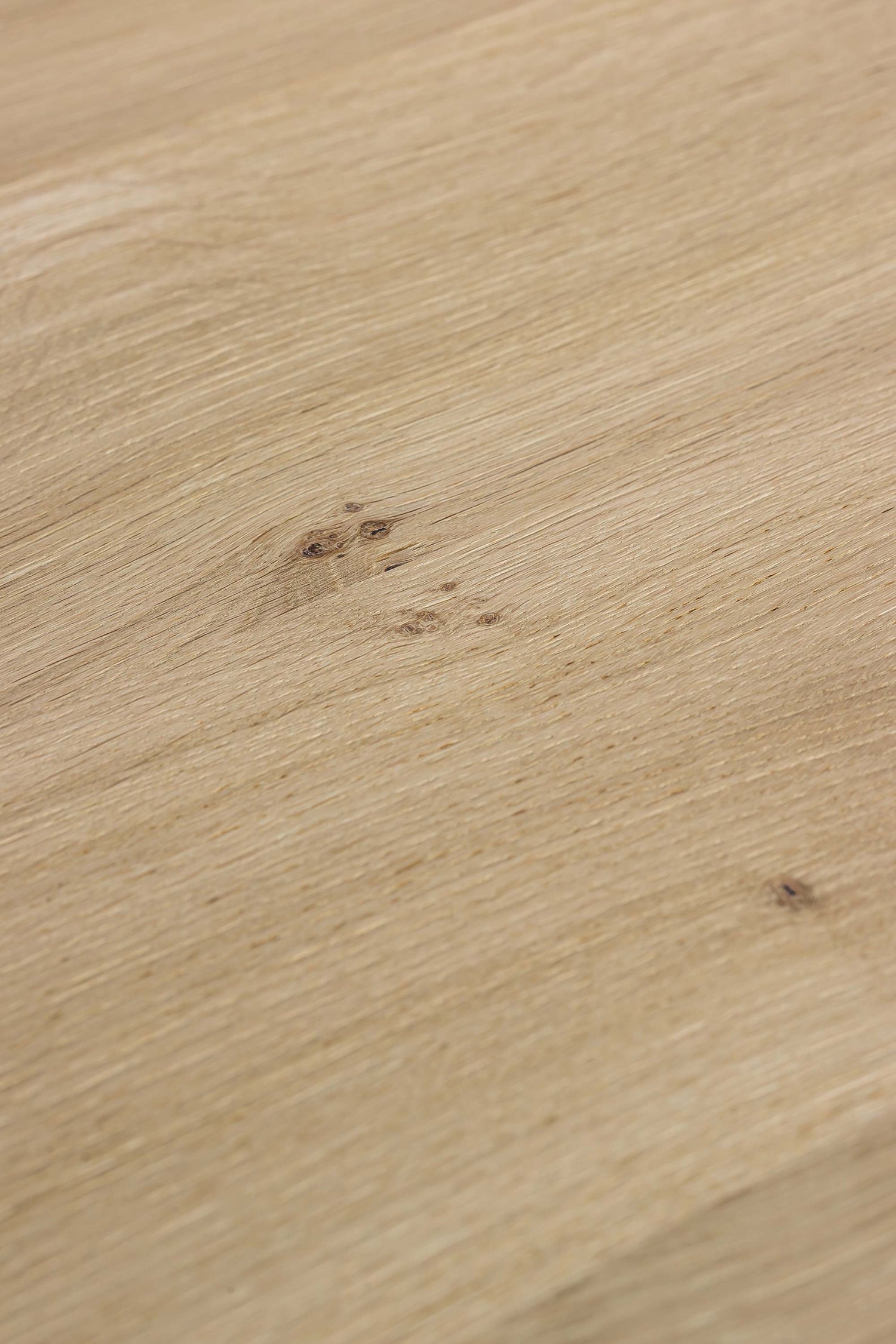 Close-up of the natural oak wood grain of the Brix Table by Heerenhuis.