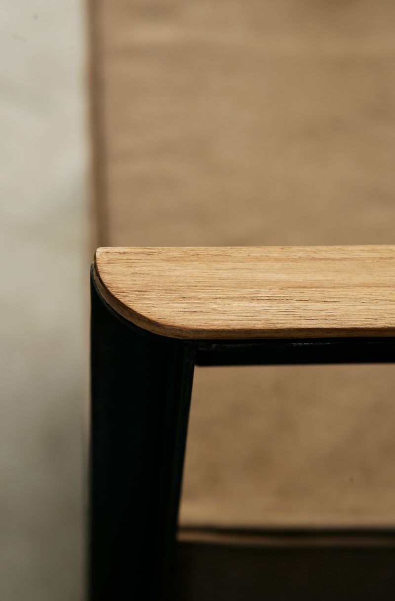 Heerenhuis Cargo Armchair Canvas - detail of the metal and wood armrest.