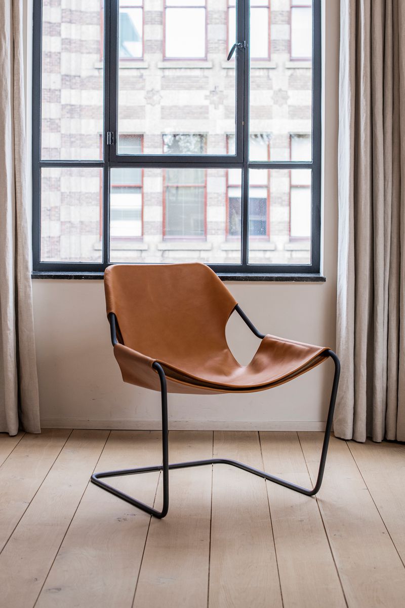 Paulistano Chair Phosphate Black Frame with Whisky coloured leather; by Objekto.