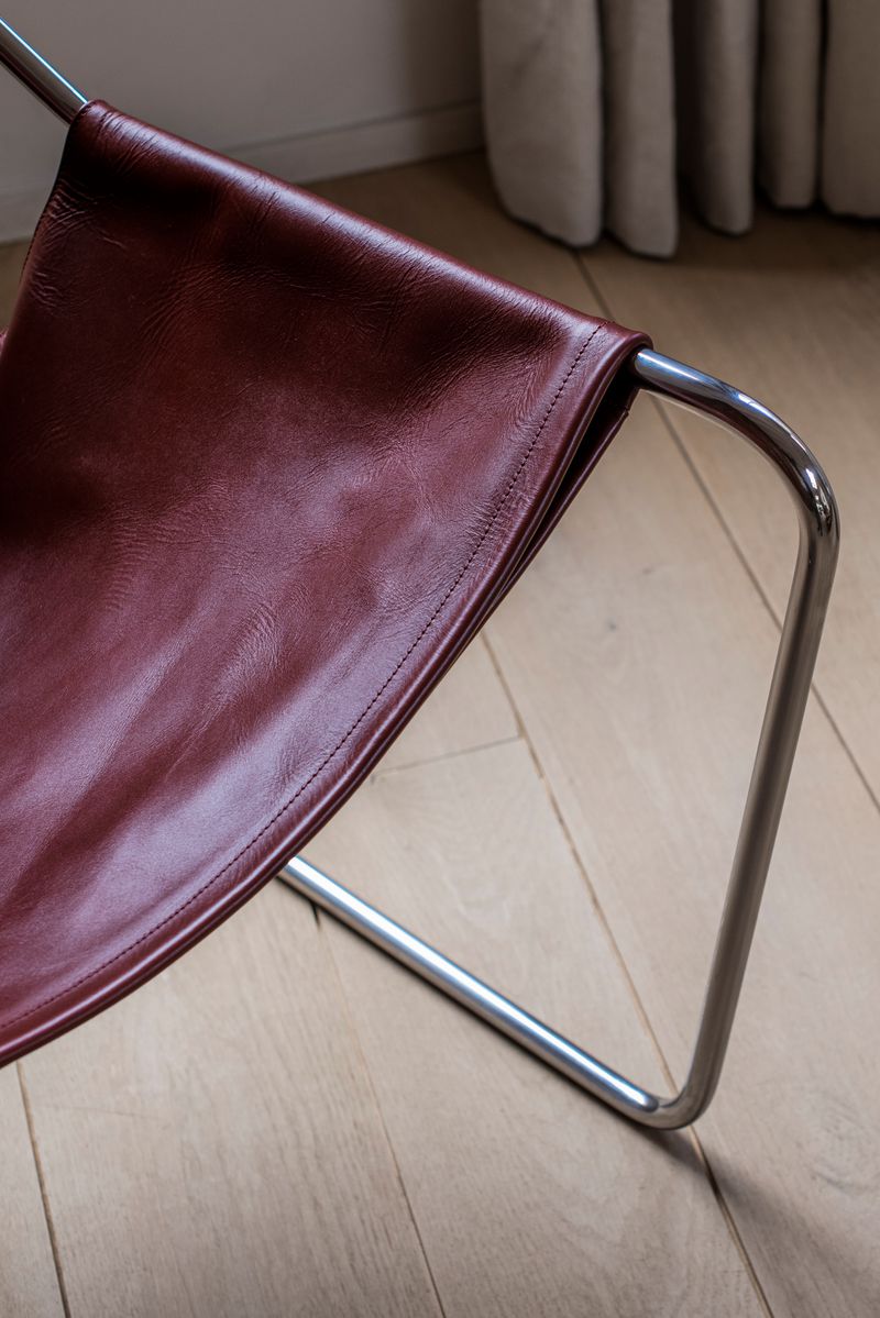 Details of the Stainless Steel Frame and Cognac Leather of the Paulistano Chair by Objekto.
