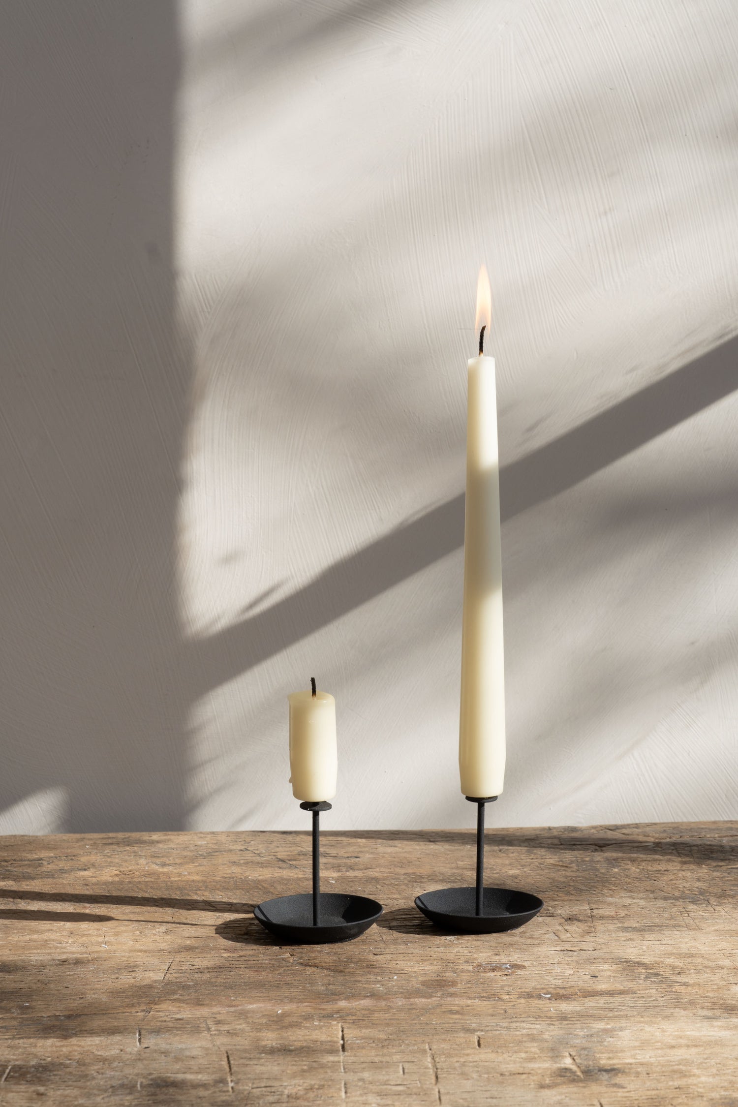 ENO Studio Micro Candle Pin Black (set of 2) -  metal candle holder in use, holding small candles securely in place. Enhances stability and creates a visually appealing display.