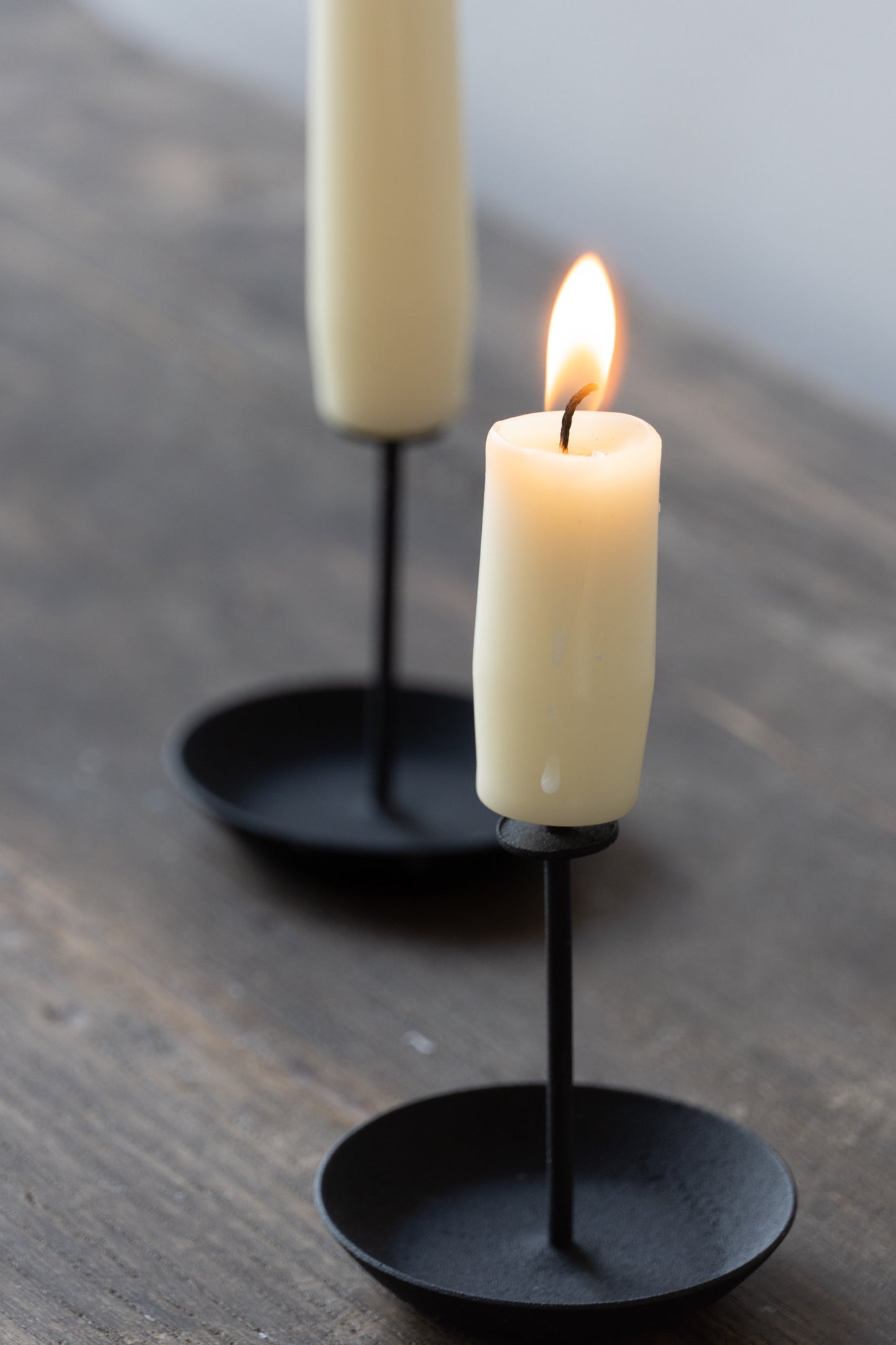 Close-up of the Micro Candle Pin (set of 2) - Metal Black Candleholders by ENO Studio