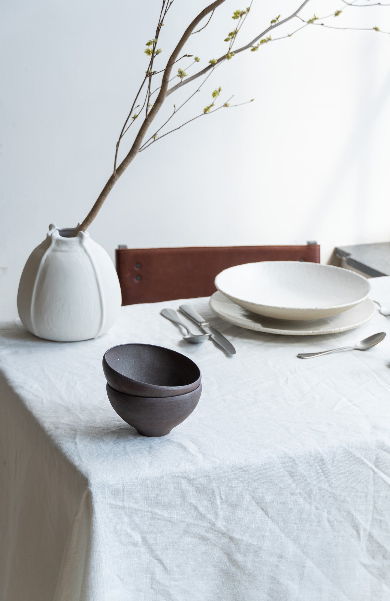 Wabi Deep Plate by Jars Ceramistes in setting